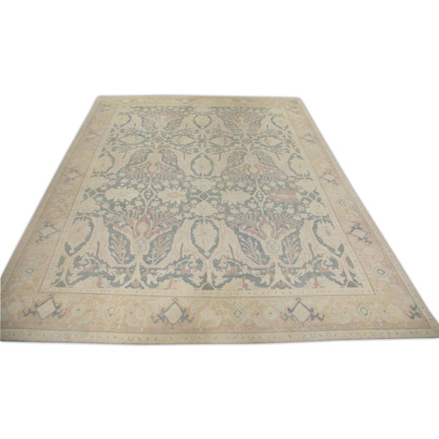 Turkish Oushak Rug Sky Blue & Soft Peach Handwoven Wool Rug 9'5" x 11'9" This Turkish Oushak rug is crafted from handwoven...