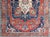 Antique Persian fine weave Serapi rug with large geometric medallion in brilliant colors and blue and tomato red. Keivan...