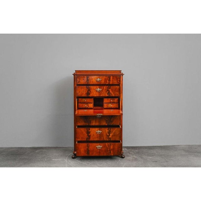 Item: Tall chest of drawers with writing compartment. Period & Style: Biedermeier - first half of the 19th century....
