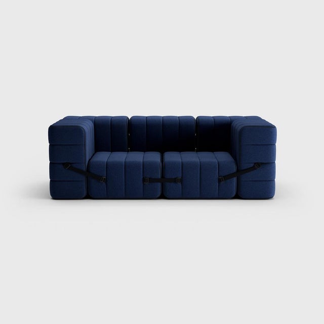 The classic seven. Why not turn a modular sofa into a classic sofa. A really compact, cosy couch with full armrests. And...