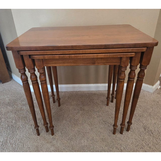 High Quality American Made Set of Three Ethan Allen Nesting Tables with elegantly turned legs. Elegant warm finish -...