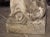 Carved Italian Limestone Statue of a Woman Holding a Bird For Sale - Image 9 of 13