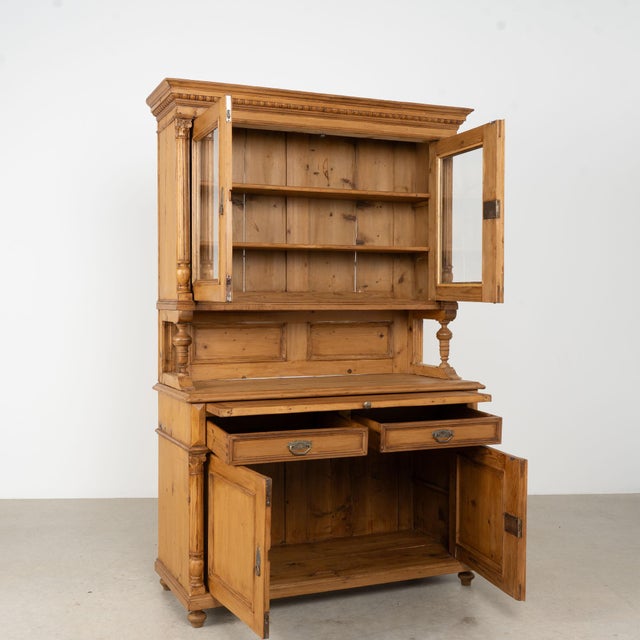 19th century Hungarian breakfront cupboard or display cabinet, crafted in pine and constructed in two sections for easier...