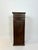 A tall vintage storage plinth, constructed from panelled wood with a concealed door to the side. Salvaged from an old...