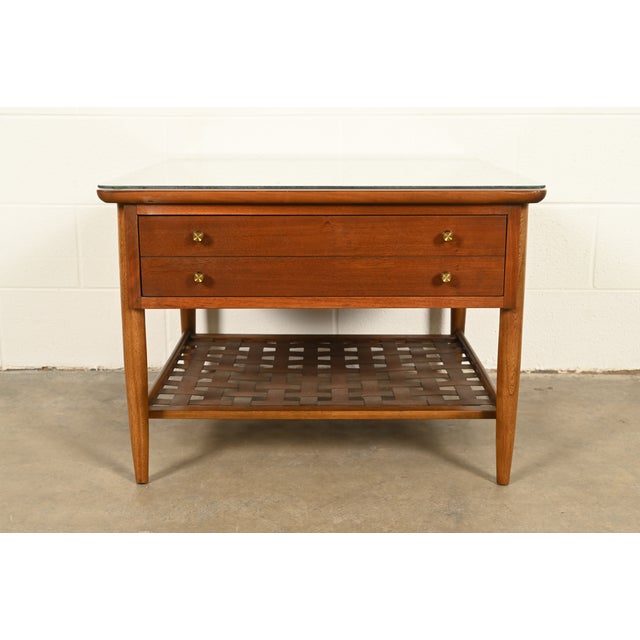 A sleek and stylish Mid-Century Modern nightstand, end table, or side table In the manner of Paul McCobb By Lane Furniture...