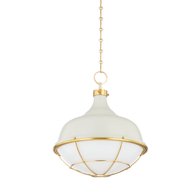 Gorgeous Aged Brass cagework and glossy opal glass give this recognizable silhouette an instant upgrade. The refined...