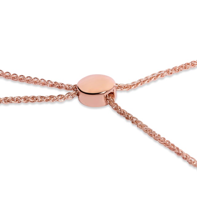 Stay on trend with this alluring chain bracelet. It is crafted of sterling silver and features interlocking heart and...