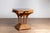 A Dutch Colonial vintage Indonesian square center table from the mid-20th century, with marble inset. Born in Indonesia...