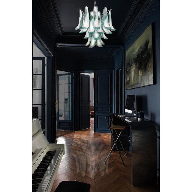 Murano Italian glass chandelier. Fantastic chandelier with turquoise and white “lattimo” glasses, nickel-plated metal...