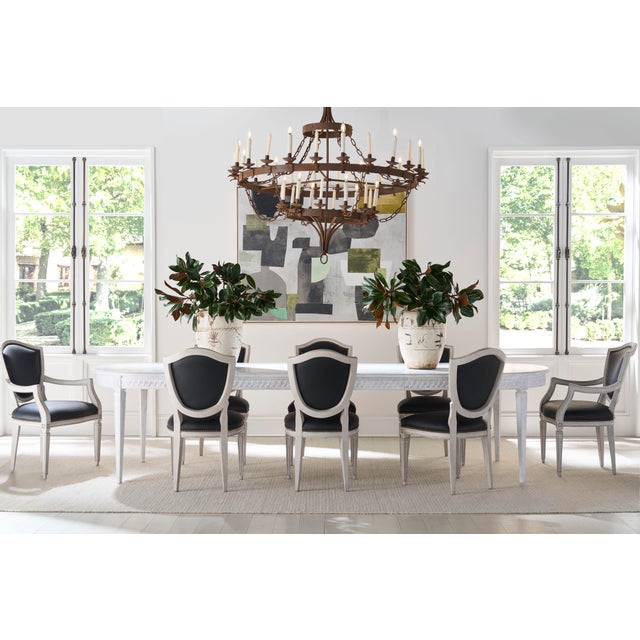 The Swedish dining table, based on 18th century designs with bead and reelcarvings, reflects the Gustavian style, which...