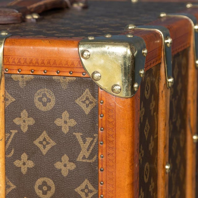 A stunning early 20th century louis vuitton wardrobe trunk covered in the world famous lv monogrammed canvas. With its...
