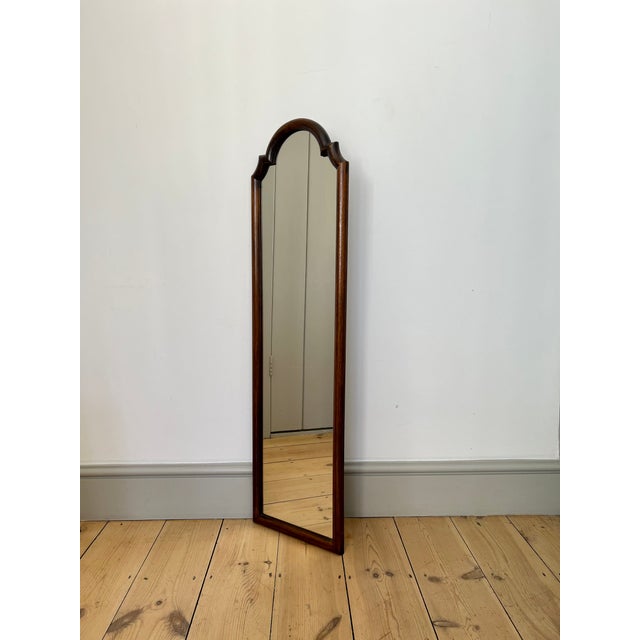 Tall, slim mirror from France, dating from the early part of the 20th century. Perfect for a narrow space. Solid rounded...