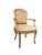 An elegant vintage French Provincial armchair inspired by the fluid forms of Louis XV seating, featuring a carved painted...