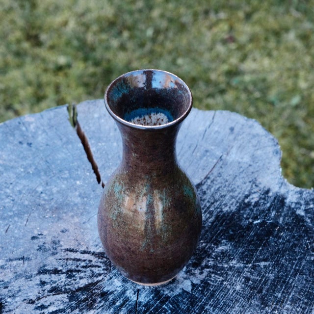 Stoneware vase, wheel-thrown from speckled stoneware and hand-painted with "Matcha Gloss Shino" glaze. Brand: Hiraeth...