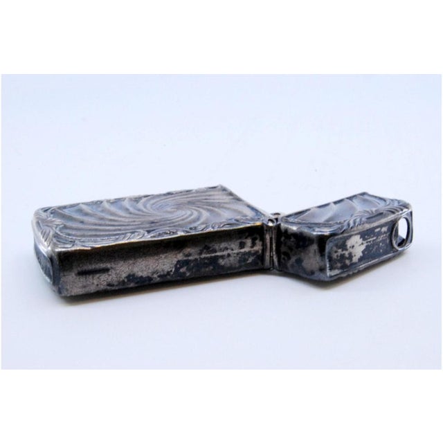 Silver Matchbox with Reliefs and Central Vortex, in Very Good conditions. Designed from 2000 This piece has an attribution...