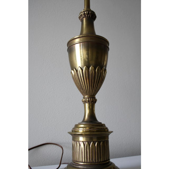 Wonderful, neoclassical style table lamp made by Stiffel. Vintage, from the Mid 20th century, with a naturally aged patina...