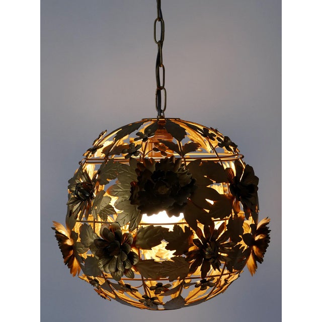 Extremely rare, amazing and highly decorative mid-century modern metal floral pendant lamp. Manufactured in germany,...