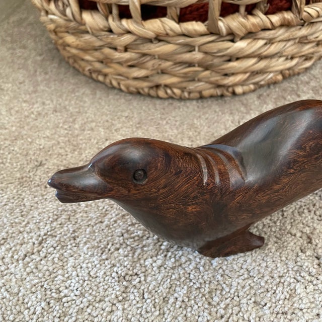 Elegant hand-carved iron wood 1970’s sea lion. Iron wood is very dense and hard with a beautiful color and polish and...
