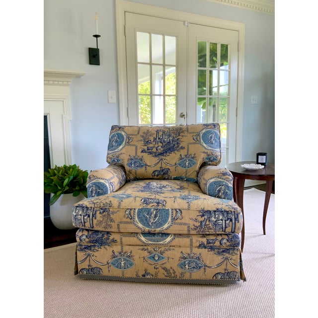 Custom upholstered club chair in Braquenié “Les Muses Et Le Lion” fabric from Pierre Frey, color Sable Bleu, with Cowtan &...