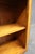 Ethan Allen low bookcase crafted in cherry with a warm golden-brown finish. Features a simple rectangular form with two...