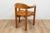 Wooden dining chair with armrests by Rainer Daumiller for Hirtshals Savværk. The chair is made out of pine wood. I have...