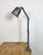 This vintage Industrial adjustable table lamp was produced by Memlite in United Kingdom during the 1960s. The lamp has a...