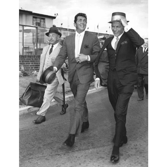 Jazz singers of the day Dean Martin and Frank Sinatra walk in the breeze towards their next show\. 16" x 20" print Silver...