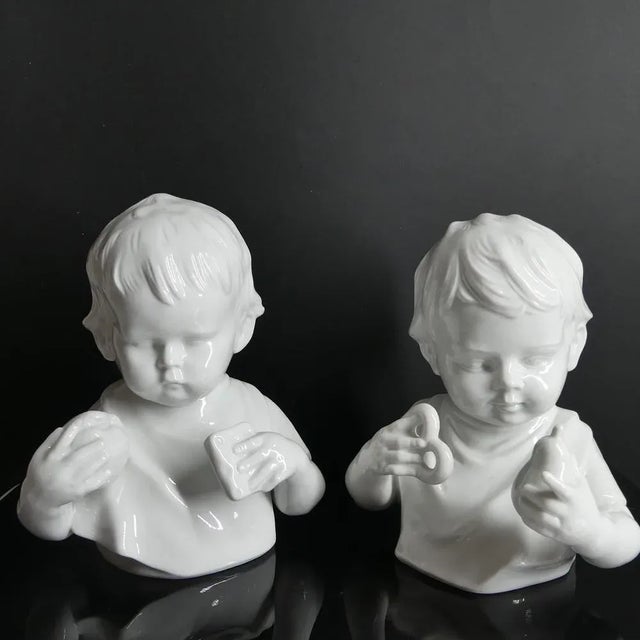 Two very cute children's sculptures from the Gräfenthal manufactory. The little ones can also be used as bookends. This...