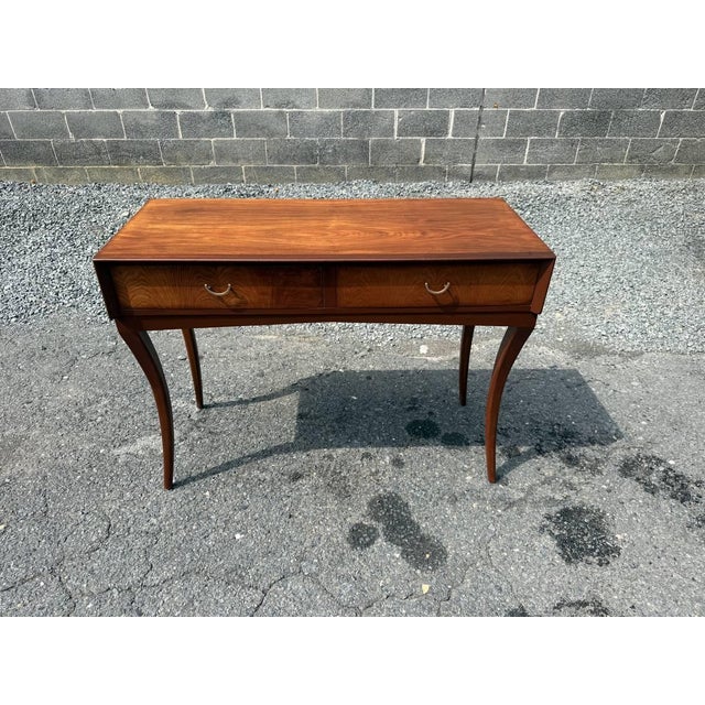 Vintage Biedermeier Style Console Table or Writing Table Desk It features rectangular-shaped top, slender sabre legs and...