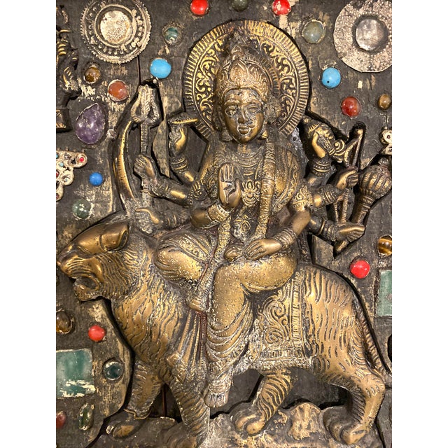 An extraordinary antique Nepalese Hindu devotional wall shrine, dating to the late 19th or early 20th century, most likely...