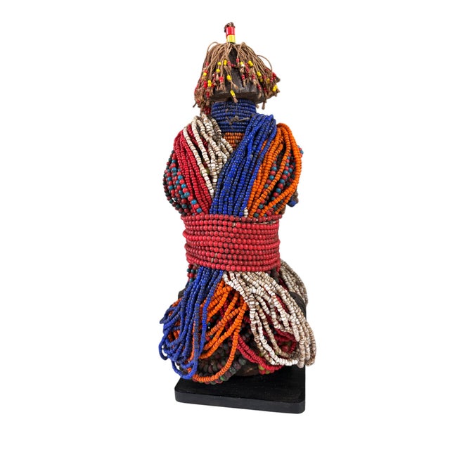 Superb vintage African Fali fertility doll decorated with multiple layers of trade glass beads and cowrie shells, minor...