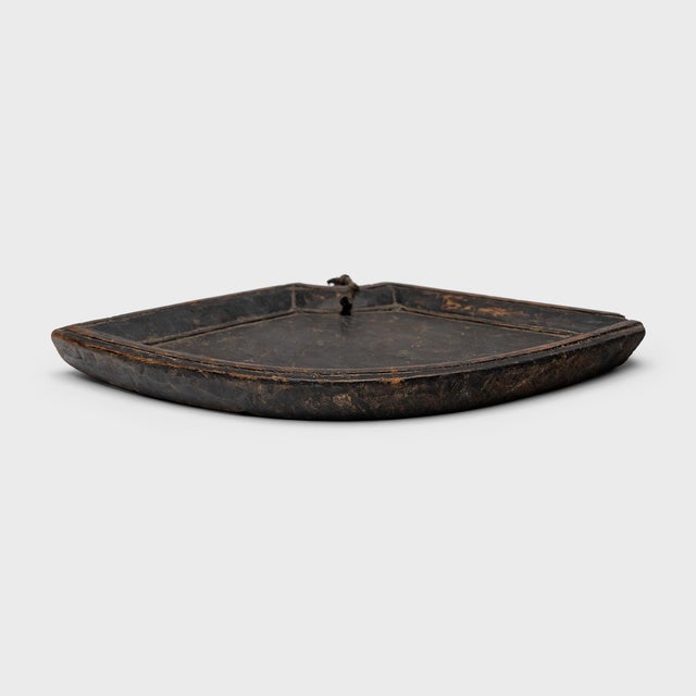 This small Chinese tray from the mid-19th century expresses the quiet beauty of humble objects. Likely used atop a woman's...