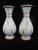 Pair of Chinese cloisonné 20th century vases. Enamel on brass, showing white ground adorned with bands of colorful flowers...