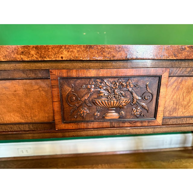 Regency style side board. Piece has extensive woodworking and detail.