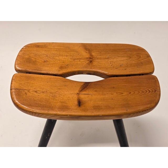 Pirkka stool, designed by Ilmari Tapiovaara, made by Laukaan Puu. Manufacturer's stamps on the base. The stool is in good...