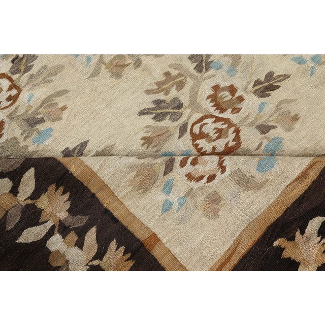 This exquisite antique Bessarabian rug, woven in the early 20th century, showcases the distinct charm and elegance of...
