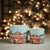 Add a charming holiday touch to your seasonal decor with this set of two Merry Christmas Village Planters. Designed in...