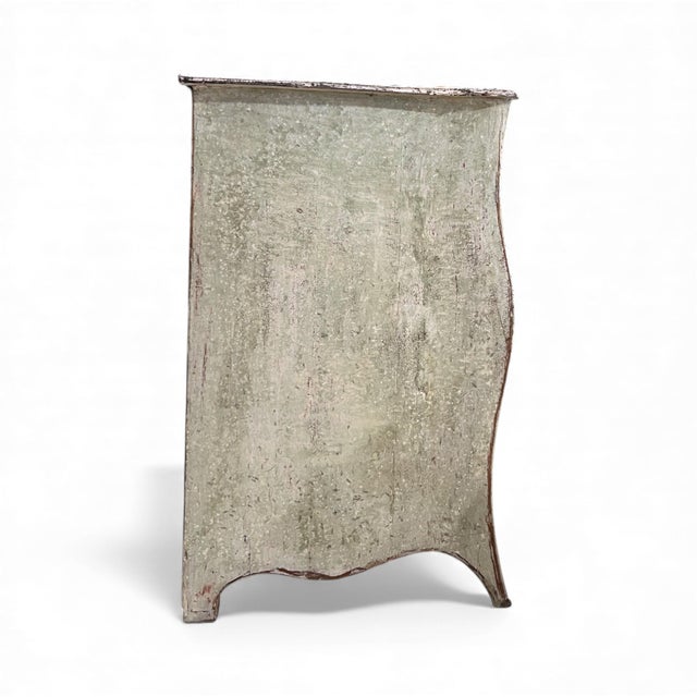 This German Rococo chest, dating to the 1700s, exemplifies the exuberance and artistry of the Rococo period. Decorated...