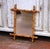 This charming mid-century French faux bamboo wall mirror brings a warm, decorative accent to a powder room, entry,...