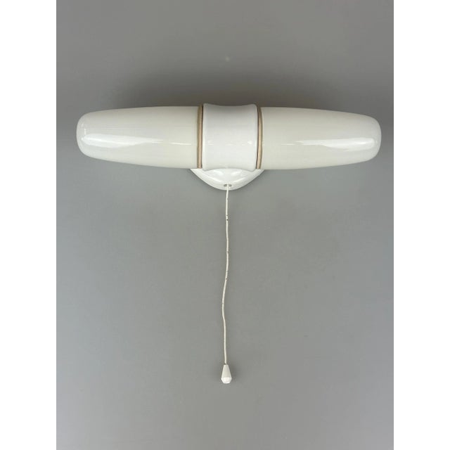 1950s and 1960s Ceramic Wall Lamp and Ceiling Lamp by Wilhelm Wagenfeld for Lindner Object: Wall Lamp Manufacturer:...