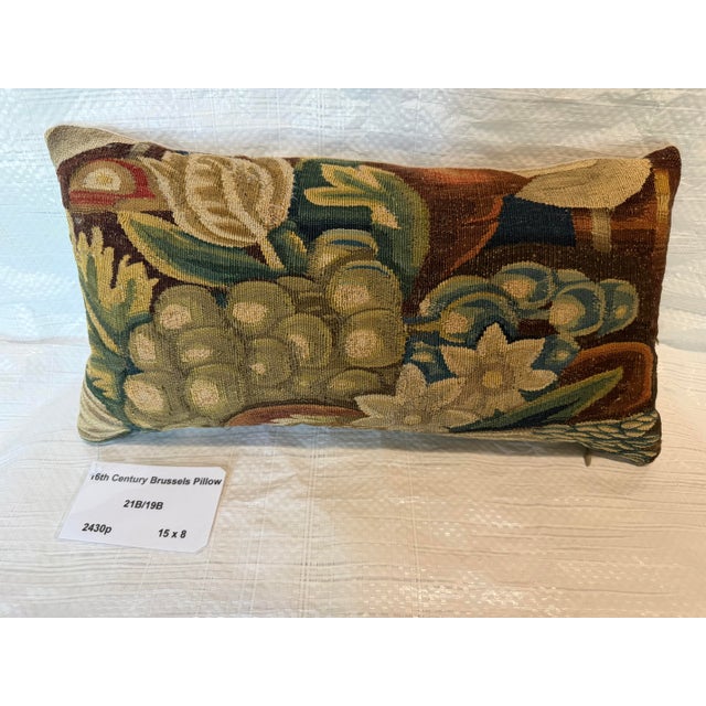 This rare decorative pillow is fashioned from an authentic 16th century Brussels tapestry fragment featuring a beautifully...
