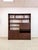 Bring timeless mid-century style and functionality into your home with this vintage walnut MCM wall unit. Featuring a...