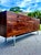 Mid-century modern rosewood lowboy dresser or credenza. In the style of Founders Furniture. An absolute stunning piece,...