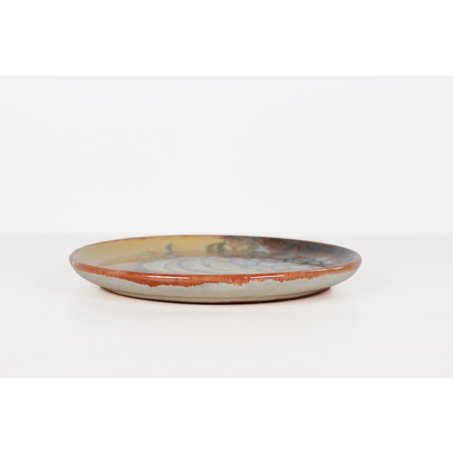 A hand-painted majolica plate signed "Capelo, Gto. Mex." on the reverse, from Guanajuato, Mexico — a maker's mark...