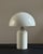Atollo lamp, designed by Vico Magistretti for Oluce, circa 1970s. Lamp made of white lacquered metal. Light diffusion with...