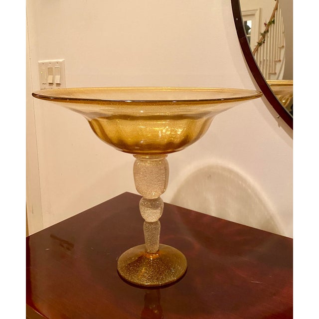 Murano Style Gold Infused Hand Blown Glass Centerpiece Bowl. This Pedestal Base is infused with gold leaf speckles which...