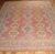 An early 20th Century Turkish Oushak Rug with an all over crab design on a pinky red ground Details rug no. j3139 size 11'...