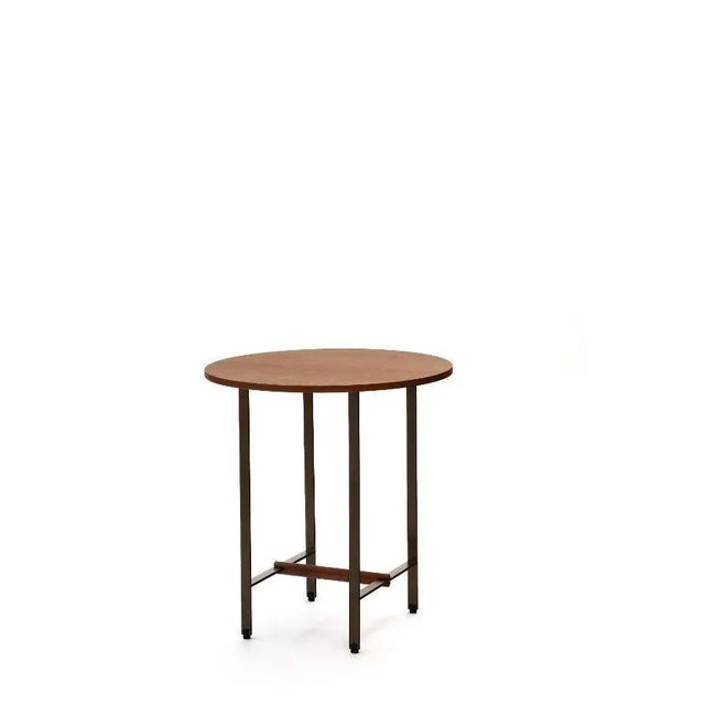 Walnut round sisters side table by Patricia Urquiola Materials: Bronze lacquered structure with the solid walnut cross...