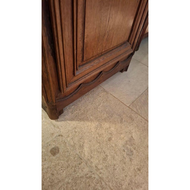 Solid oak armoire, late 19th century. It has two shelves. The piece is fully demountable. Style: Louis XIV - Regency