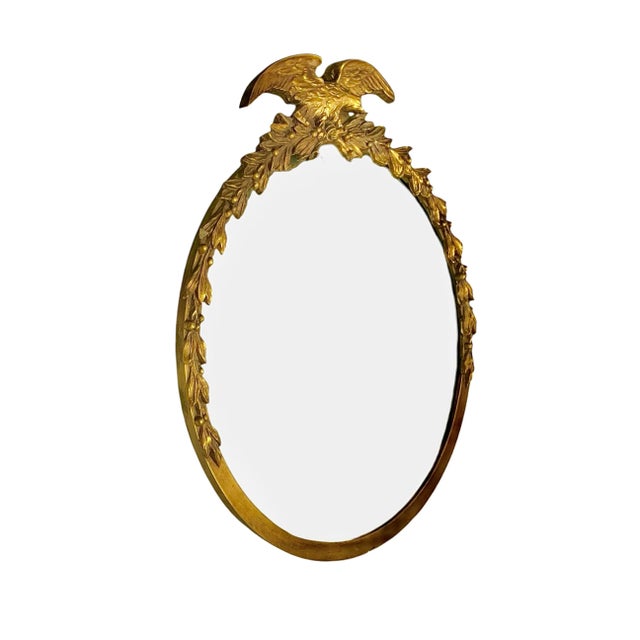Rare vintage round federal eagle mirror in wood frame with carved wreath. True American collector's mirror. Condition: in...